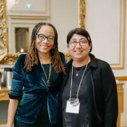 Keynote speaker Dorothy Roberts smiles next to West Coast LEAF executive director Raji Mangat.