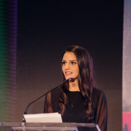 Anita Bathe introduces the speakers and board members.