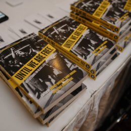 A close up of Sandy Hudsons book "Until we are Free".