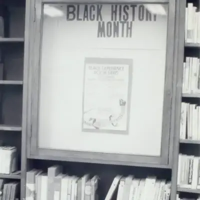 A black and white photograph of a library display titled "Black History Month".
